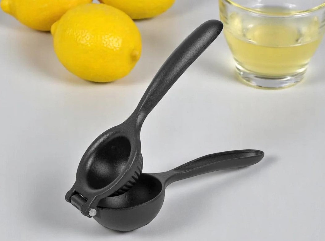 Black hand lemon squeezer